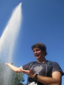 Ralph Morrison standing next to a geyser.