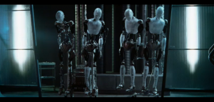 In the final scene of the film 'I, Robot', Sonny (a unique NS5 robot chosen  by their designer) stands atop a hill overlooking scores of freed NS5s, who  are themselves standing between