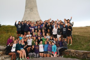The team enjoys apples, donuts, and apple cider at the top of Mt. Greylock!