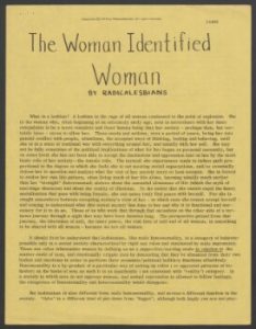 A slightly yellow paper filled with small text reads "The Woman Identified Woman" at the top of the page