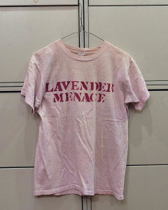 A light purple shirt reads "Lavender Menace" in all capital letters