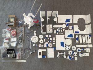 Many of the 78 printed parts that will be assembled into the Polyformer.