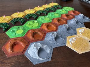 3D printed Catan hexes, complete with my favorite detail--red silos for wheat storage.