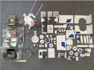 Polyformer 3D printed parts and electronics ready to be assembled.