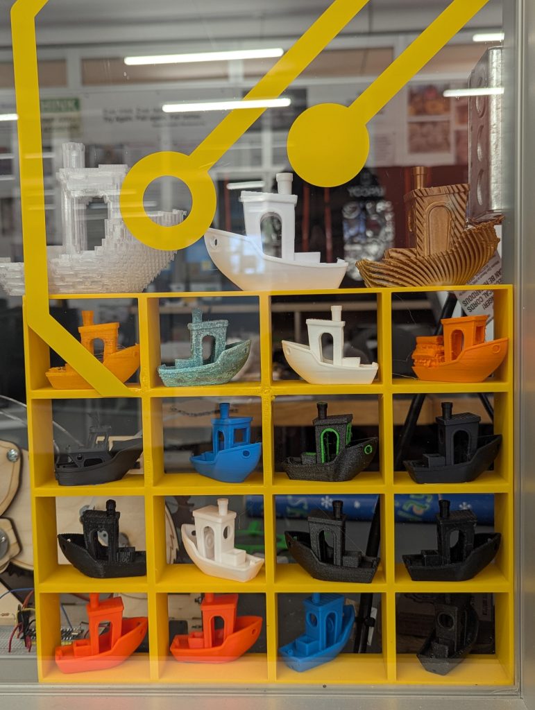 One year later, my custom storage shelf is happily filled with calibration test prints by our student workers.