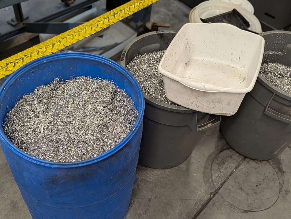 Aluminum shavings from the Science Shop's CNC machines were repurposed and cast into aluminum blocks.