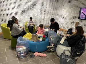 Participants working to craft the reef. 