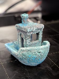The 3D Benchy boat after (correctly) using a spray bottle (vinegar, water, salt) to initiate the oxidization process.