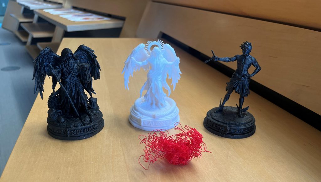 My finished prints! From left to right: Chronos, Aion, and Kairos. Below: red spaghetti :)