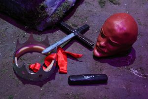 Various props, including the 3D-printed Lenin sculptural head, in Jane Su's senior theater thesis Hamletmachine #2026