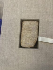 Cuneiform tablet (early written tax document on baked clay)