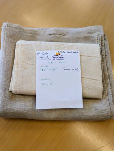 Surplus linen fabric, cut to size, for Goodrich and Sewall.