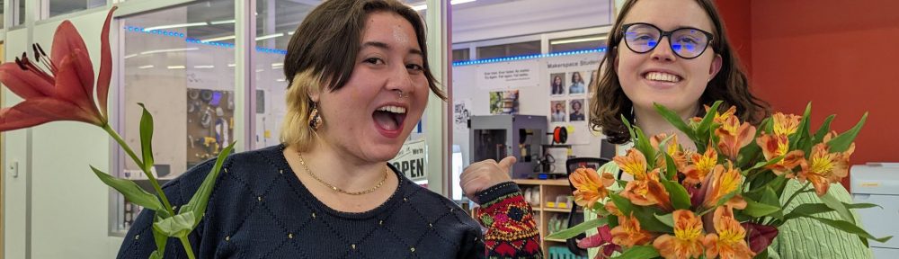 Fig. 1: Isabelle Jiménez and Harper Treschuk outside the Williams College Makerspace located in Sawyer 248