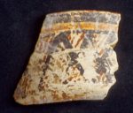Potsherd: yellow band. Maya Motul de San Jose collection of whole and partial polychrome vessels of Late Classic period.